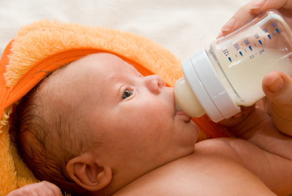 newborn baby drinking bottle