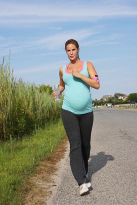 pregnant woman running