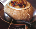 Pineapple and Sausage Rice in Coconuts