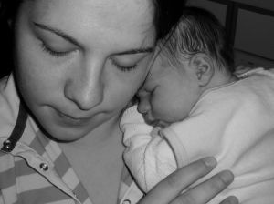 how to hold a newborn